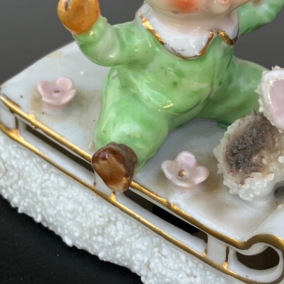 UCAGCO Japan Porcelain Sugared Sledding Boy with Puppy Figurine - Picture 11 of 12